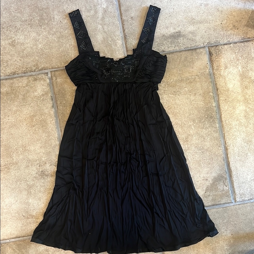 Elli tahariElegant Black Sleeveless Dress